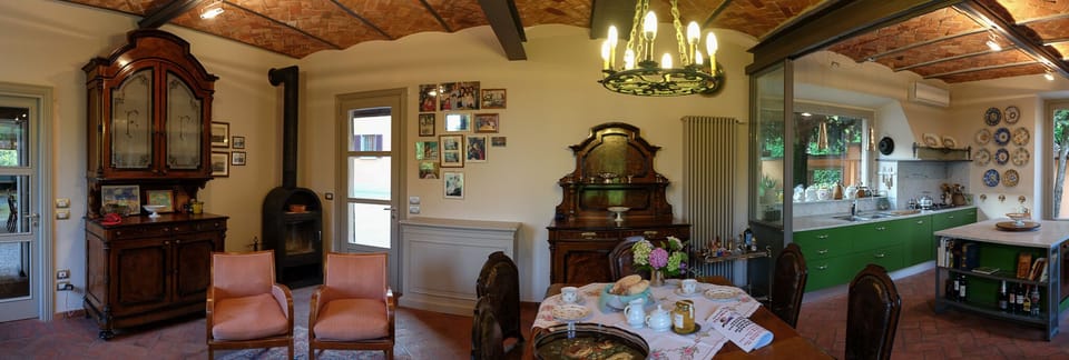 The large gourmet kitchen and informal dining space invites conviviality