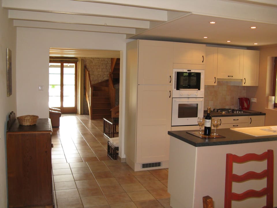 La Grange kitchen and view through to the living room