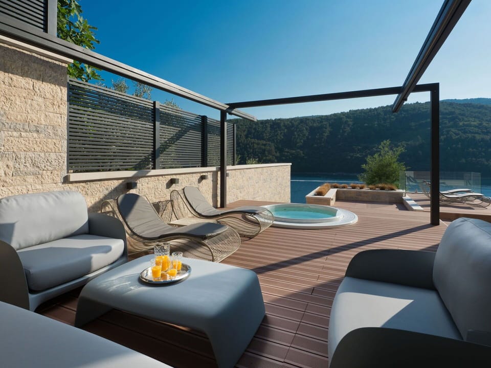 Sky, Furniture, Property, Comfort, Azure, Shade, Couch, Outdoor Furniture, Lighting, Architecture