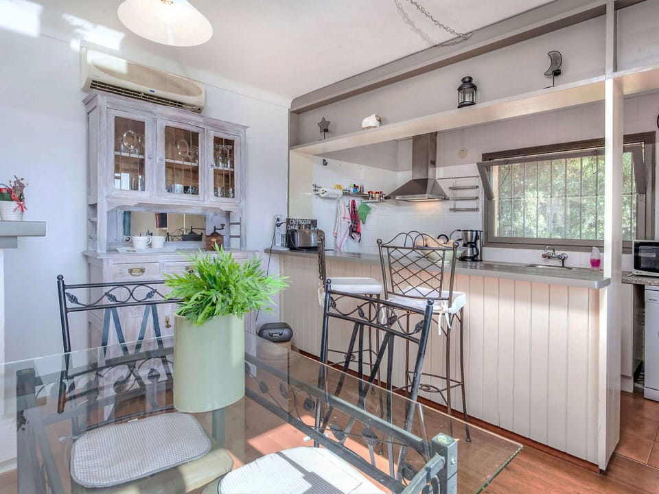 Furniture, Kitchen, Interior Design, Kitchen Appliance, Flooring, Countertop, Major Appliance, Wood, Cabinetry, Floor