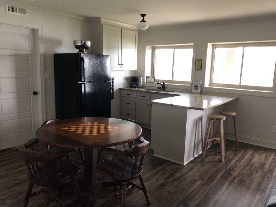 Kitchenette with full-size refrigerator and dishwasher