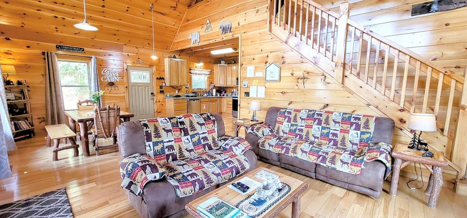 Living room opens to large covered deck