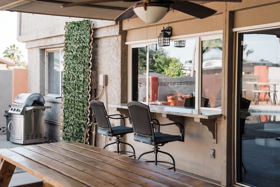 bar seating with pass thru window to kitchen