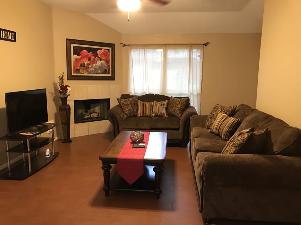 Sit back and enjoy a movie and popcorn in this relaxing and cozy living space.