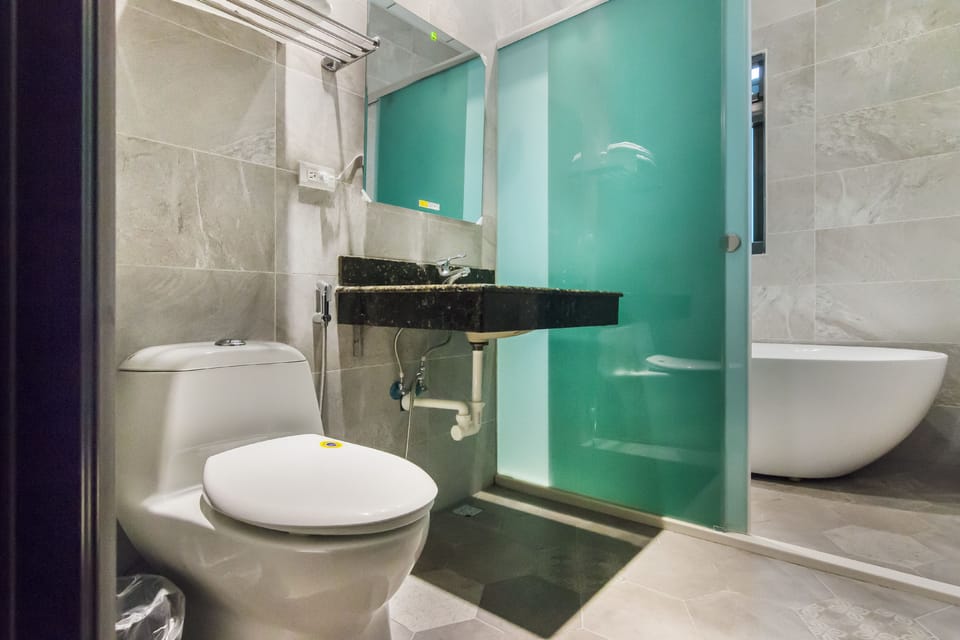 Comfort Triple Room, Balcony | Bathroom | Free toiletries, hair dryer, slippers, towels