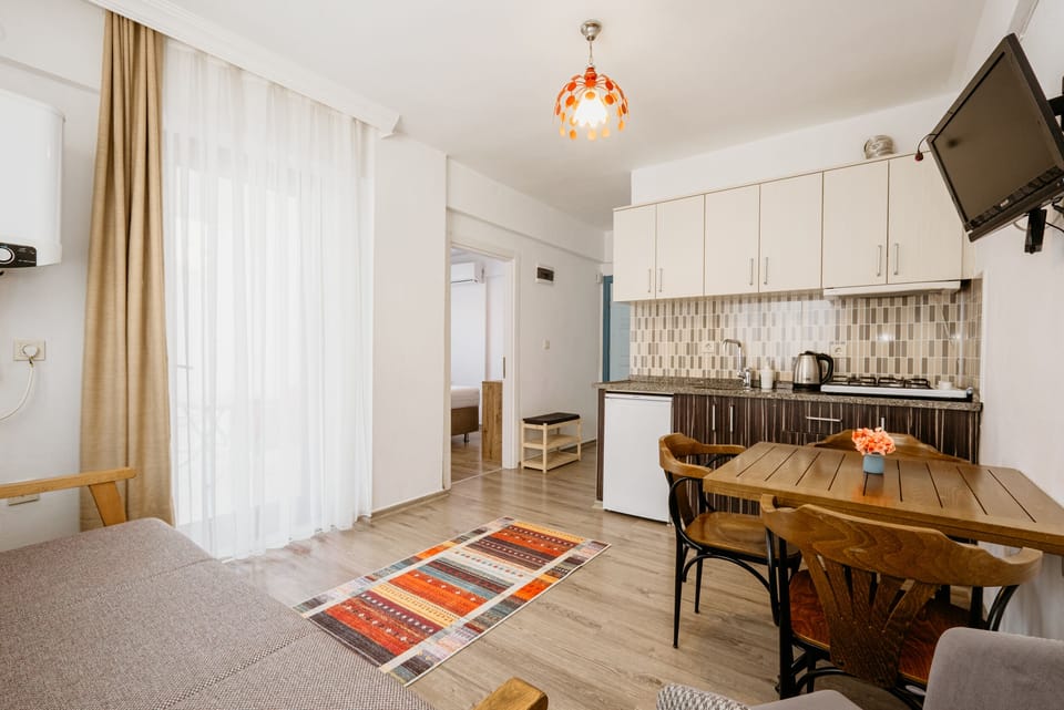 Economy Suite, Lanai, Ground Floor | Living area | 40-cm LCD TV with satellite channels, TV