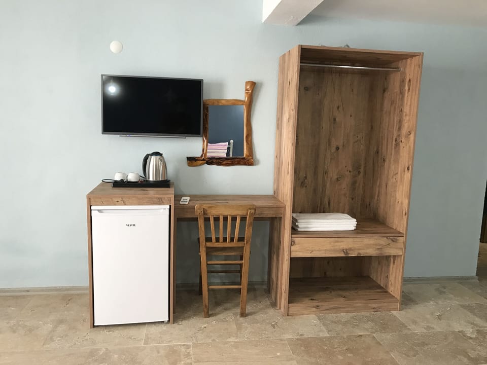 Deluxe Triple Room, Patio, Ground Floor | Room amenity