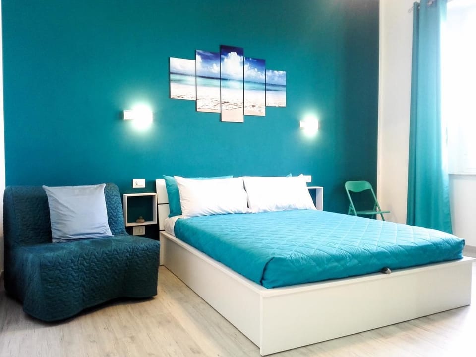 Triple Room, City View | Minibar, desk, blackout drapes, soundproofing