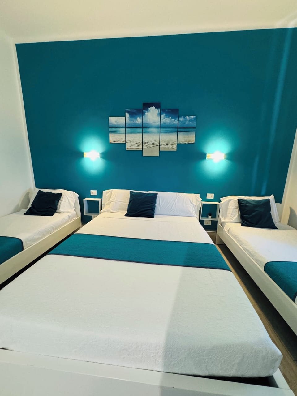 Triple Room, City View | Minibar, desk, blackout drapes, soundproofing