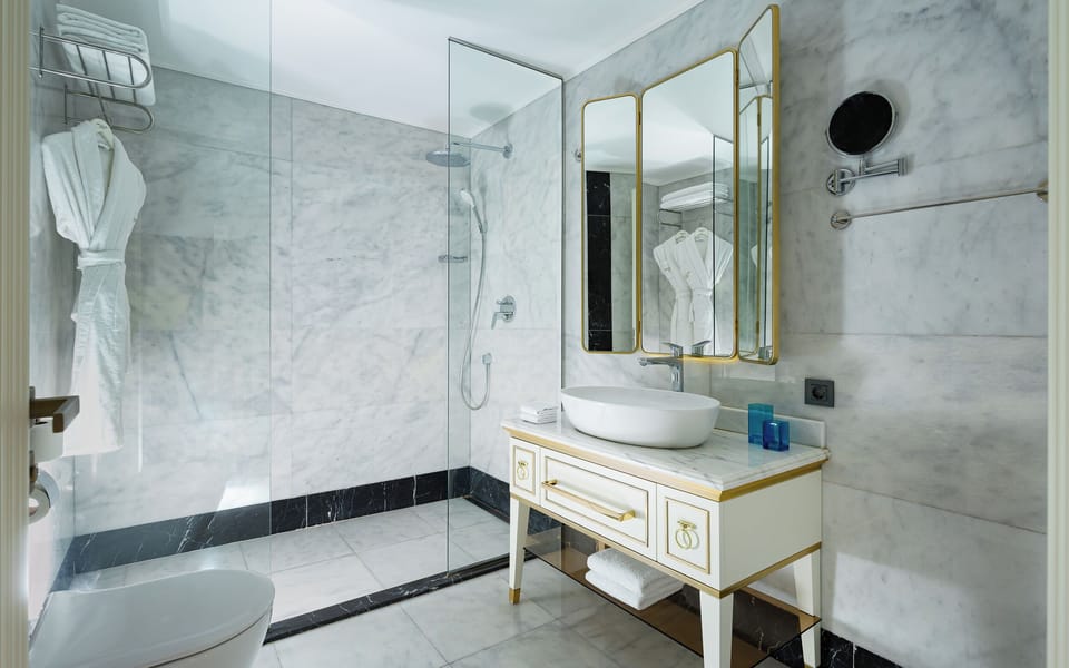 Shower, rainfall showerhead, designer toiletries, hair dryer