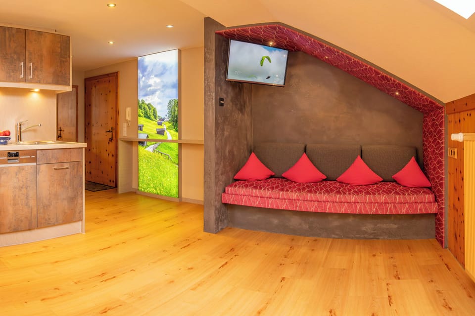 Superior Condo (Sennerin) | Living area | Flat-screen TV