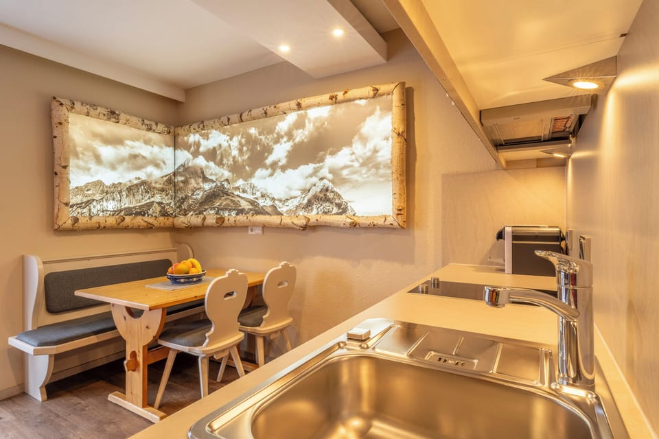 Superior Condo (Bergfex) | Private kitchen | Fridge, microwave, stovetop, dishwasher