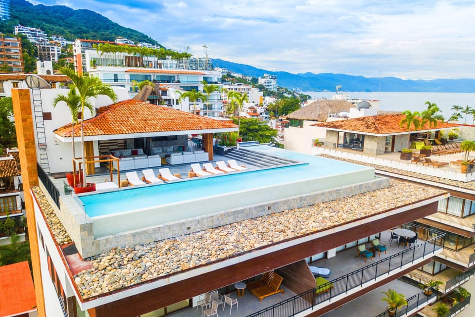Aerial view of the rooftop pool and lounge chairs