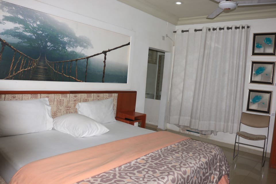 Deluxe Room, 1 Double Bed, Non Smoking | Desk, blackout drapes, bed sheets