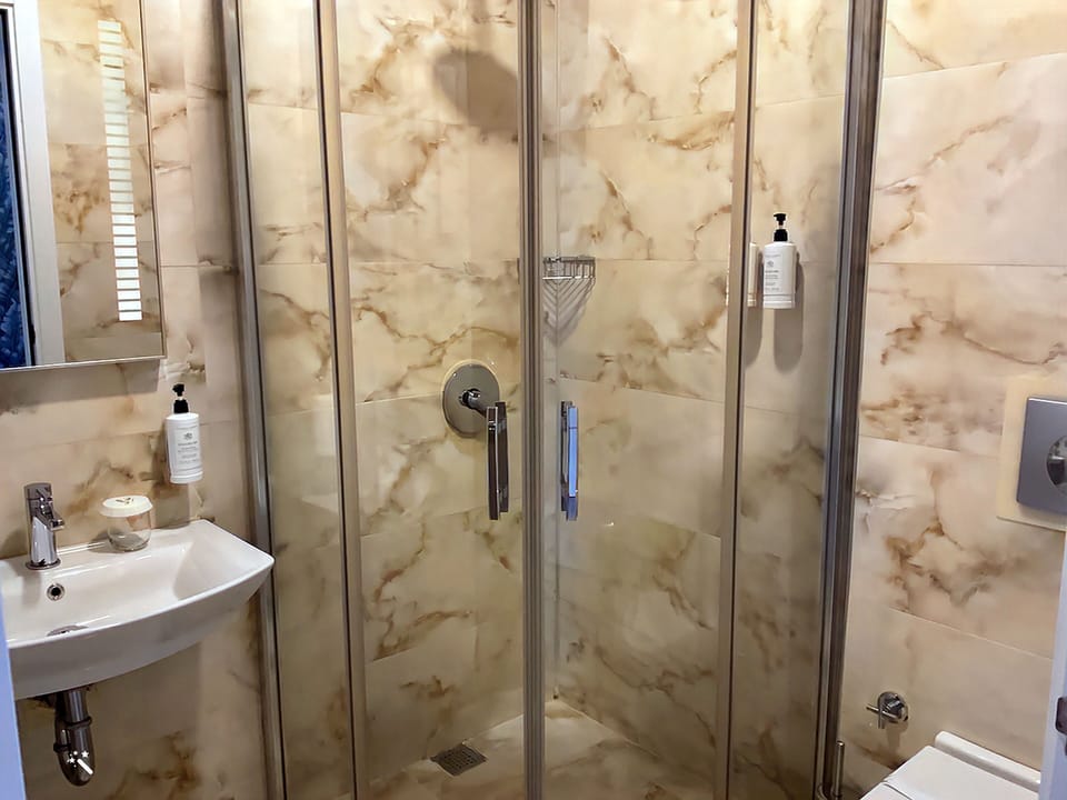 Standard Double Room, 1 Bedroom, City View | Bathroom | Shower, rainfall showerhead, designer toiletries, hair dryer