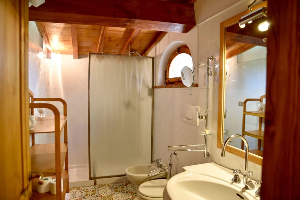 Double Room, 1 Bedroom, Balcony, Garden View (Casa Padronale) | Bathroom | Shower, slippers, bidet, towels