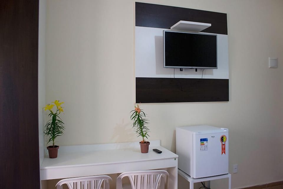 Quarto Casal | Living area | LCD TV