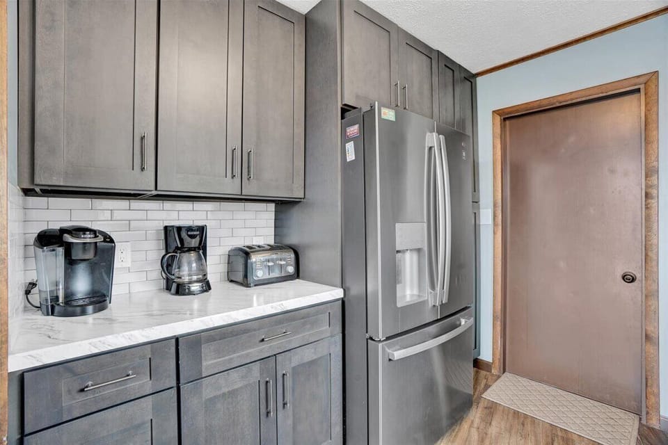 Kitchen with all the essentials - Keurig, coffee pot, toaster, crockpot & more!
