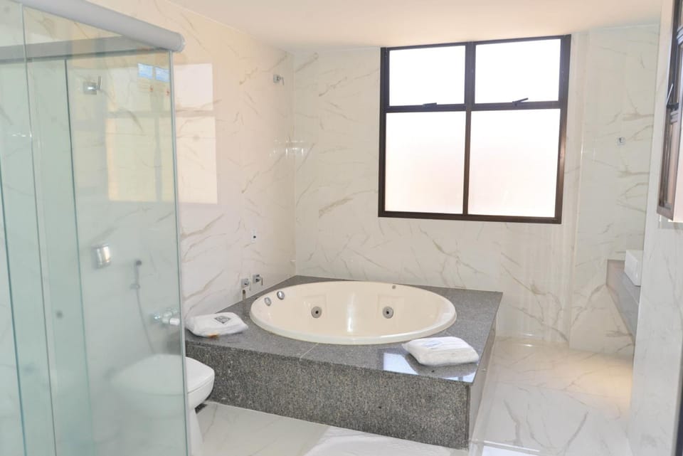 Shower, rainfall showerhead, towels