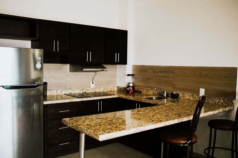 Superior Suite, 2 Queen Beds, Non Smoking, 2 Bathrooms | Private kitchen | Fridge, stovetop, cookware/dishes/utensils
