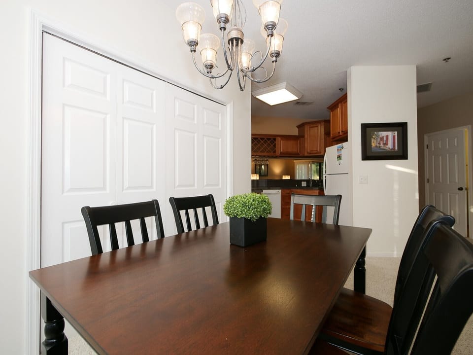 Ocean Breeze 100 - Dining Area - Dining Area located just off of the kitchen with additional closet space for pantry items.