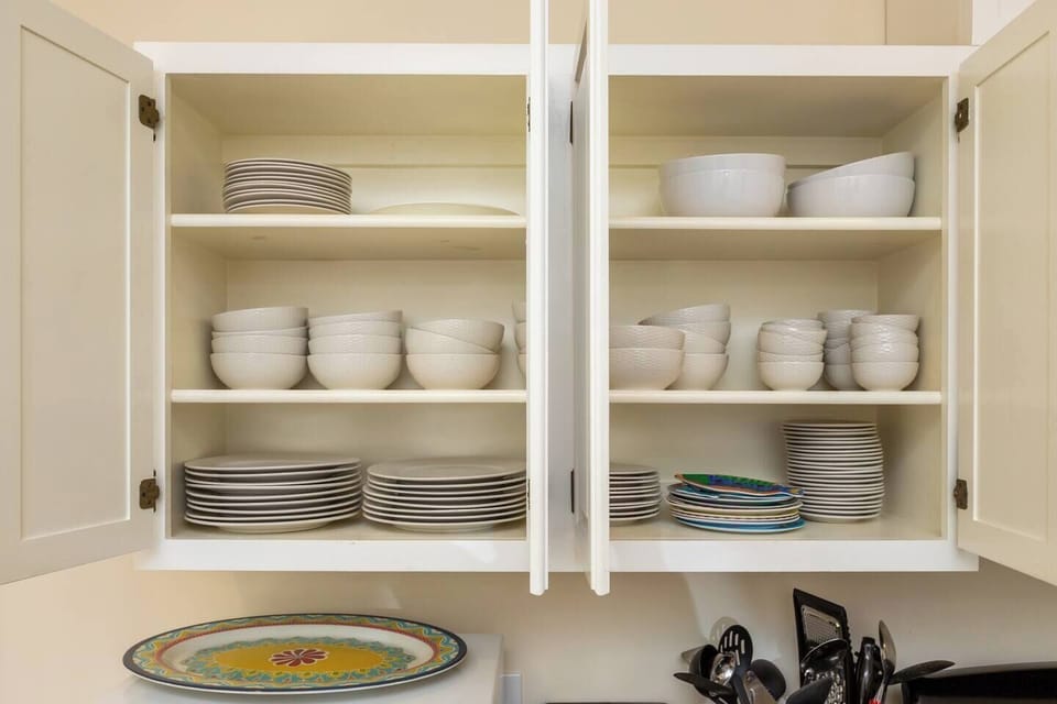 Cabinet full of dishes for every meal