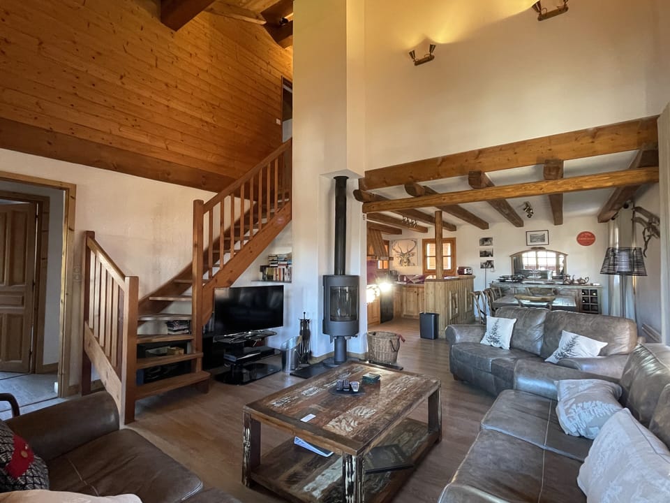 Lounge, stylish wood burning fire, 40" TV with Sky