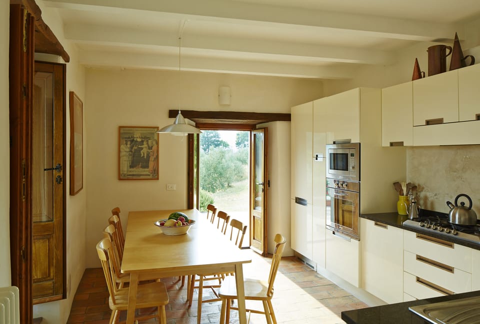The kitchen has seating for 10 - and access to the pergola and terrace