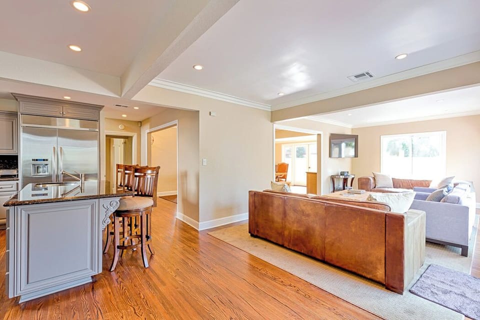 Cook and connect in our open kitchen, flowing into the family room and backyard!