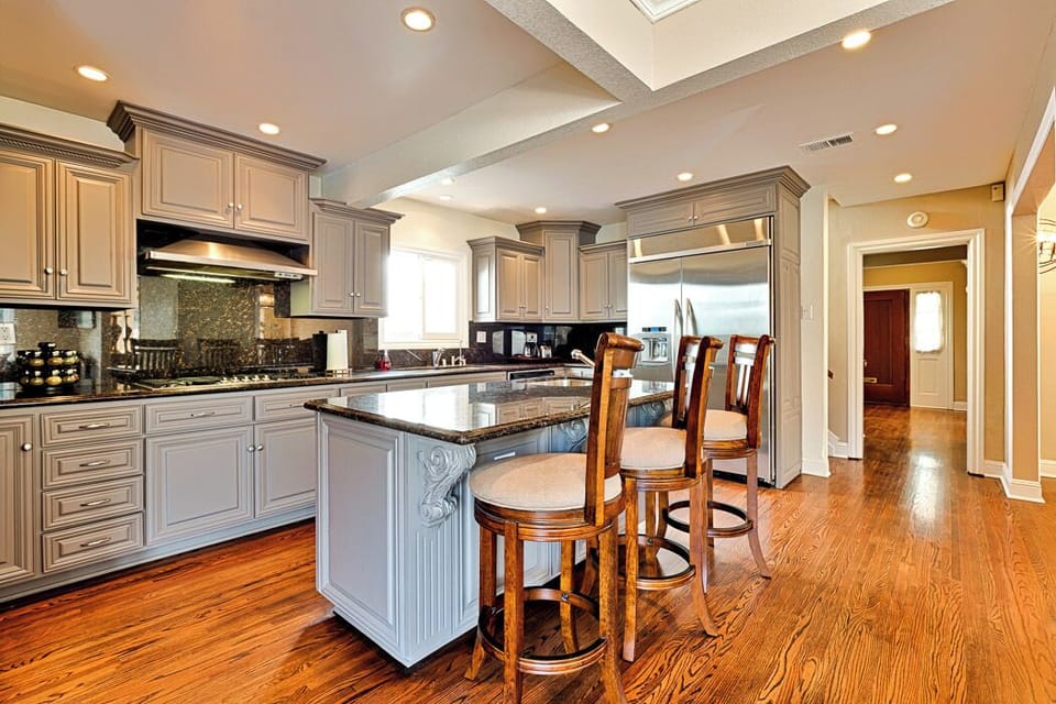 Cook & mingle in our spacious open kitchen, overlooking the family & dining room