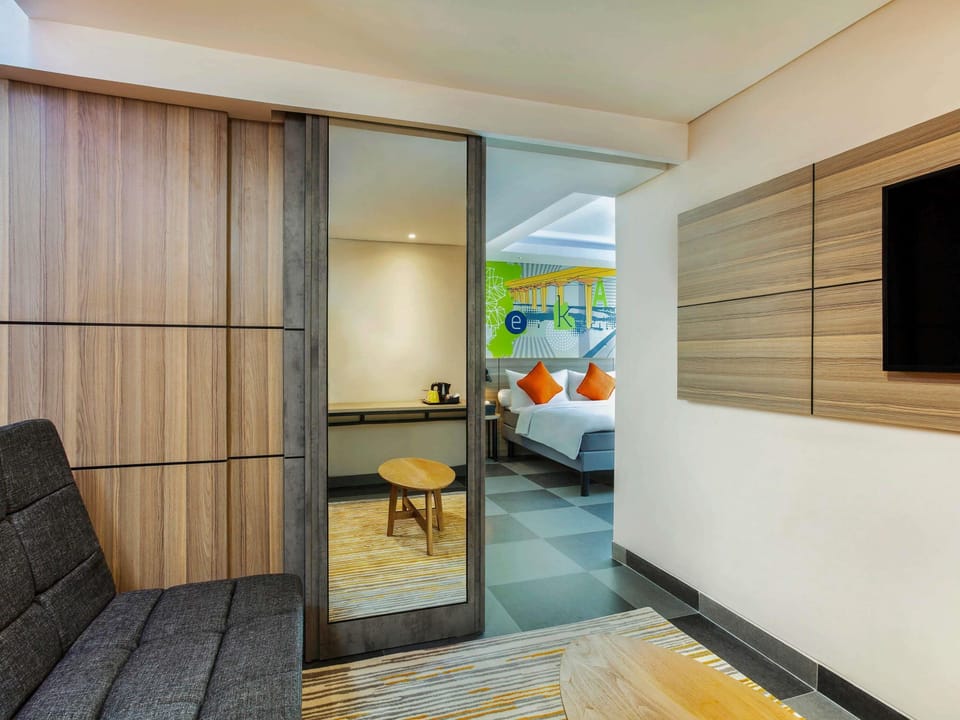 Family Room, 1 Queen Bed with Sofa bed | In-room safe, desk, soundproofing, iron/ironing board