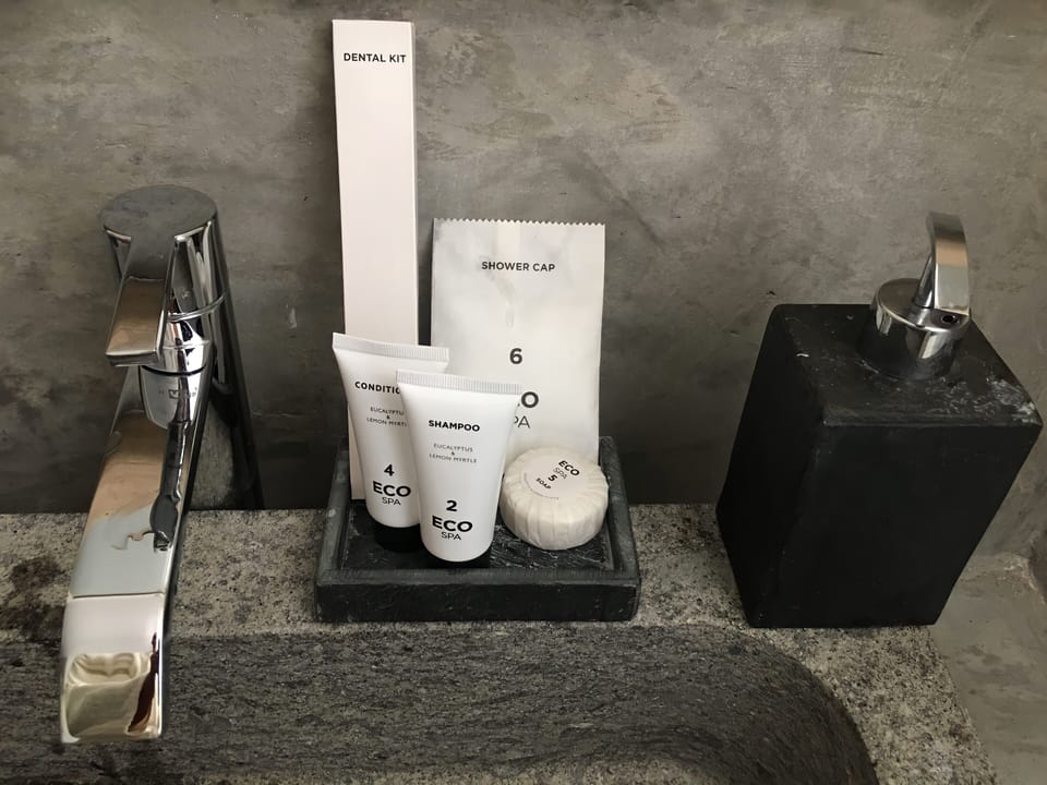 Shower, rainfall showerhead, free toiletries, hair dryer