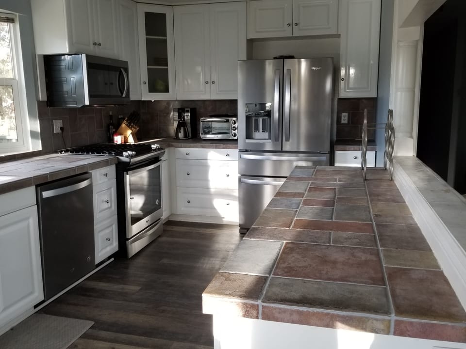 new gas stove w/ full cooking surface & oven, new fridge and washer too