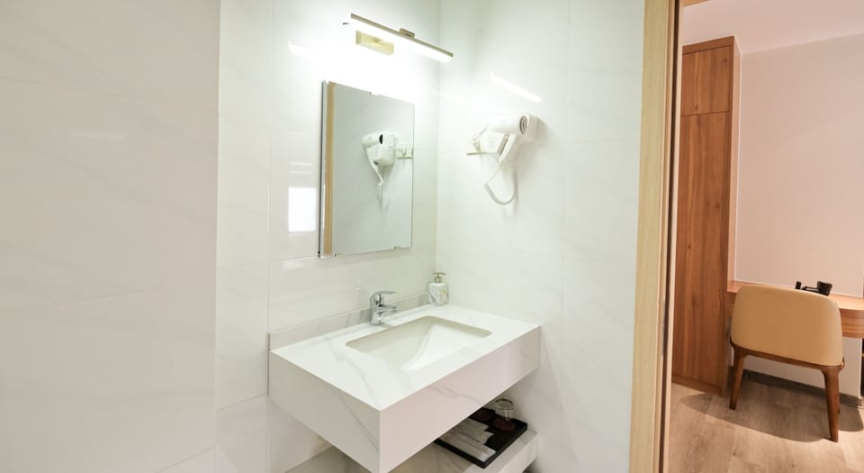 Shower, free toiletries, hair dryer, slippers