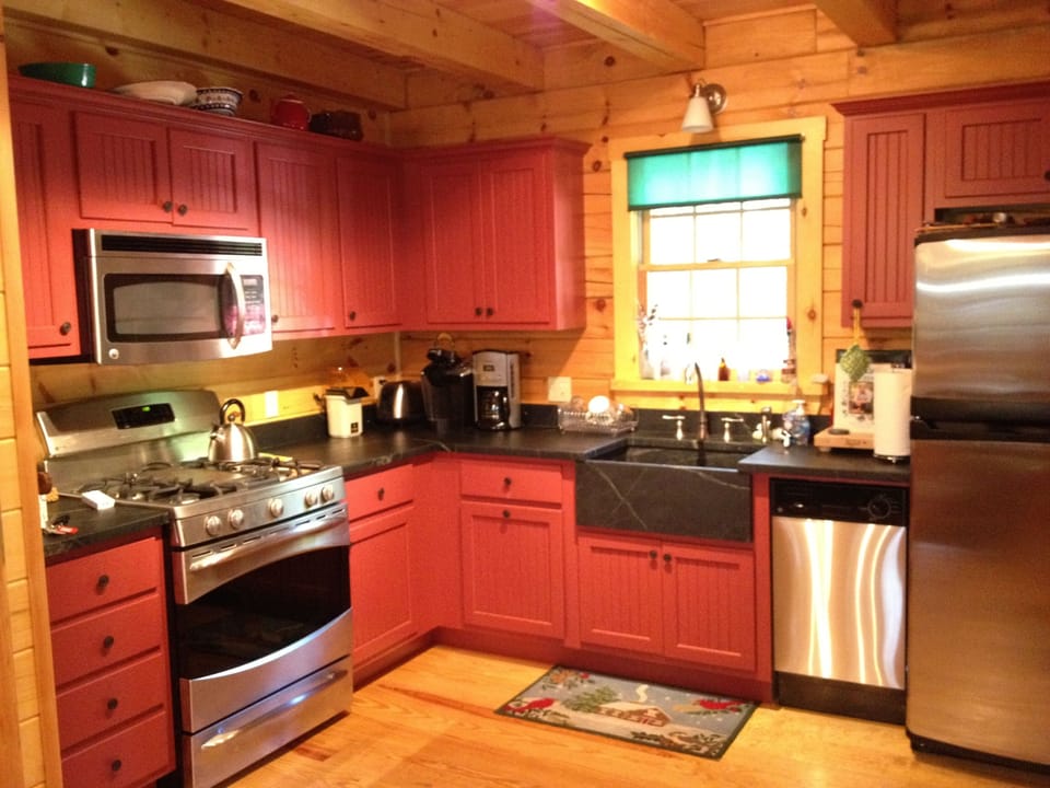 Modern, updated kitchen with full amenities and stainless steel appliances.