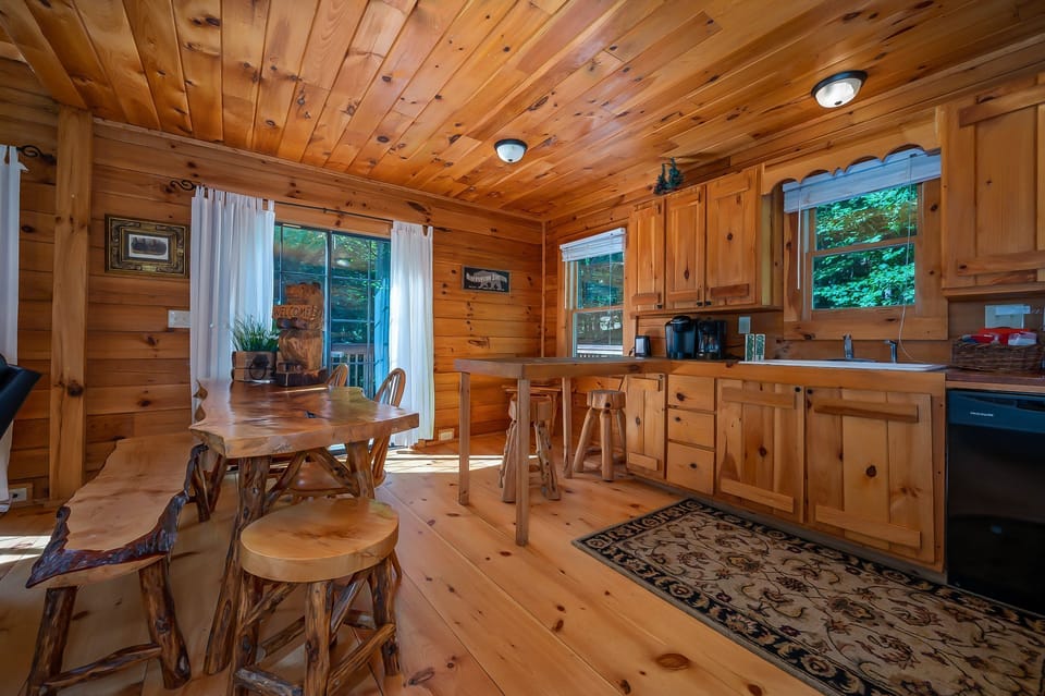 Large hand-crafted live edge dining table, seats eight and bar seats 2