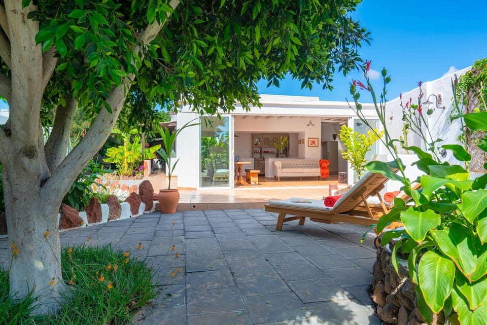 The kitchen opens up onto the garden.