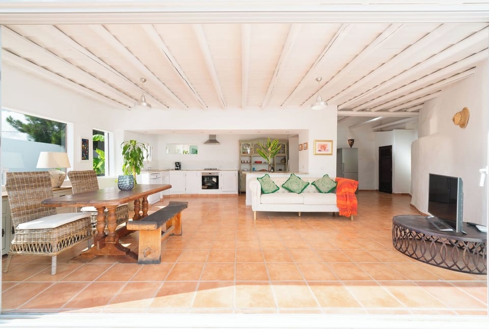 The open plan kitchen diner opens right up onto the garden.