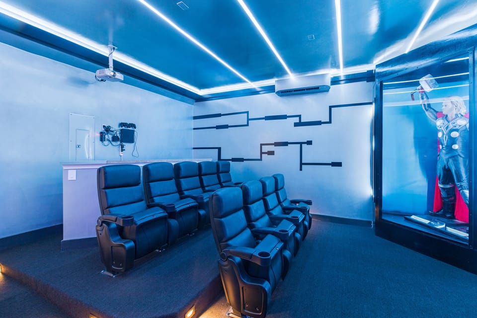 Featuring 9 comfortable recliners, 4 seats at the bar, a 120 inch movie screen, Apple TV 2 and PS4