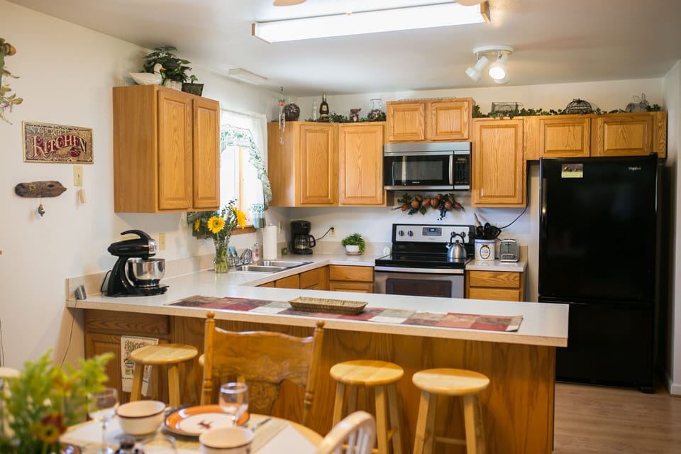 Open kitchen so the cook can participate in all the activities.