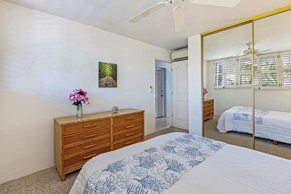 Separate AC units in each bedroom and living room.