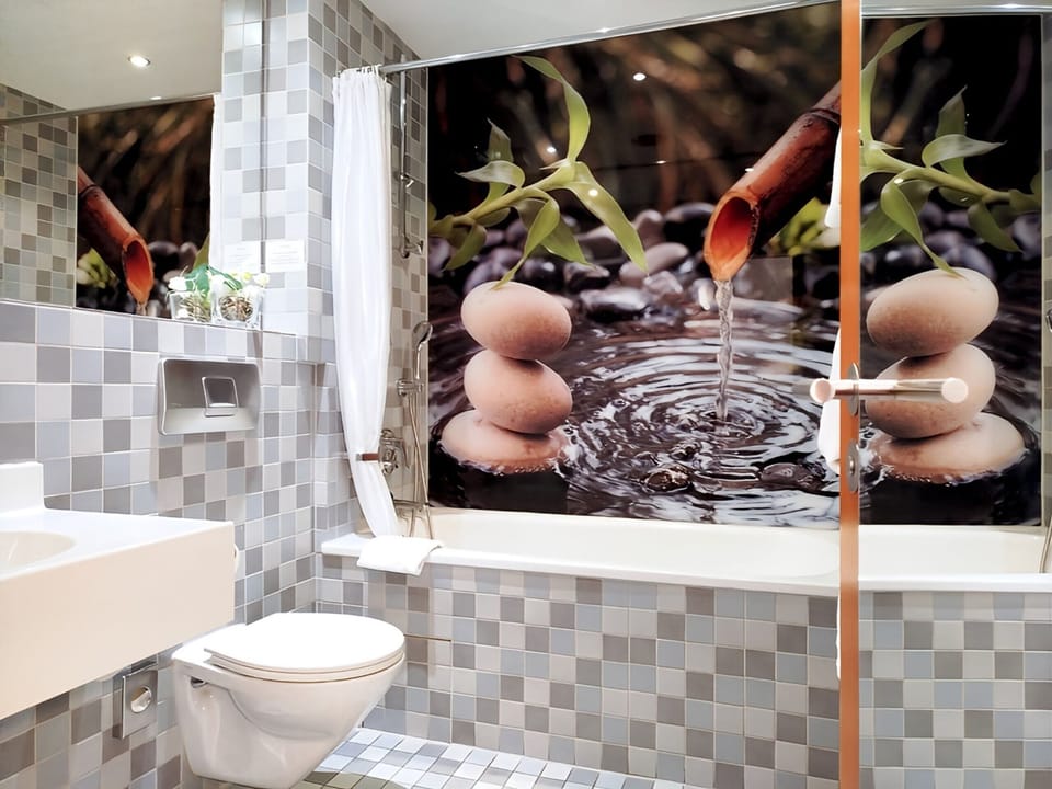Bathtub, free toiletries, hair dryer, slippers