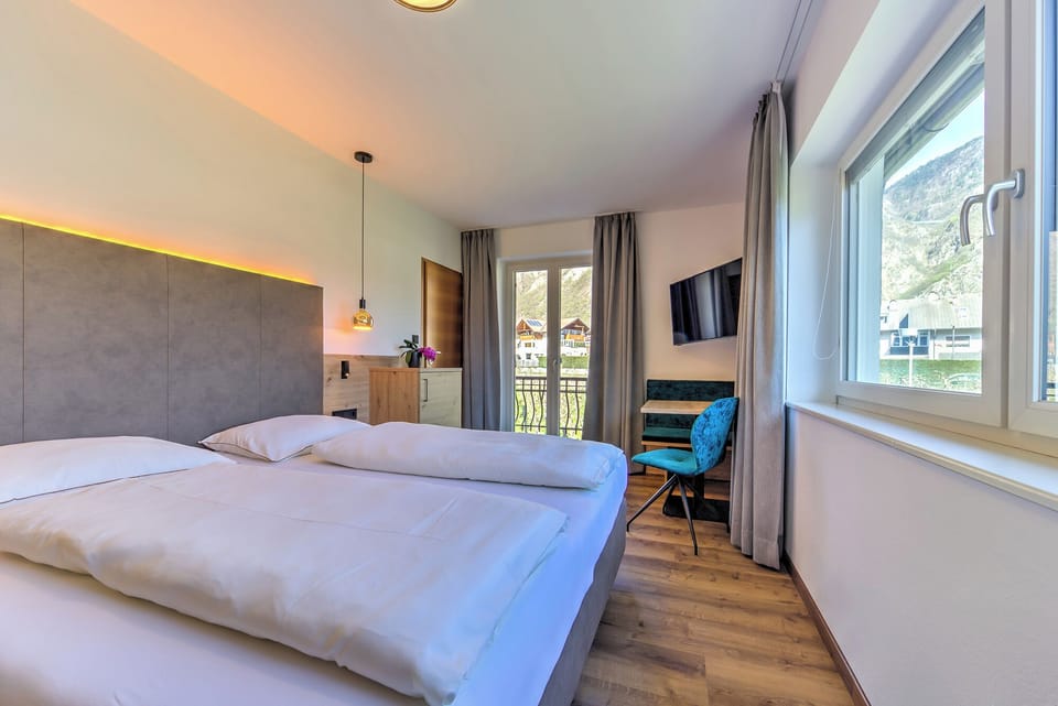 Deluxe Double Room, Balcony, Mountain View | In-room safe, individually decorated, individually furnished, desk