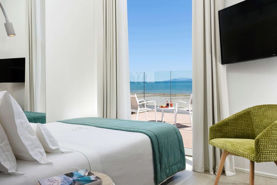Suite, 2 Bedrooms, Jetted Tub, Sea View | Minibar, in-room safe, individually furnished, desk