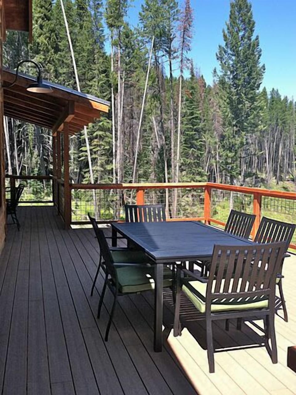 Huge deck with gas grill and plenty of seating.
