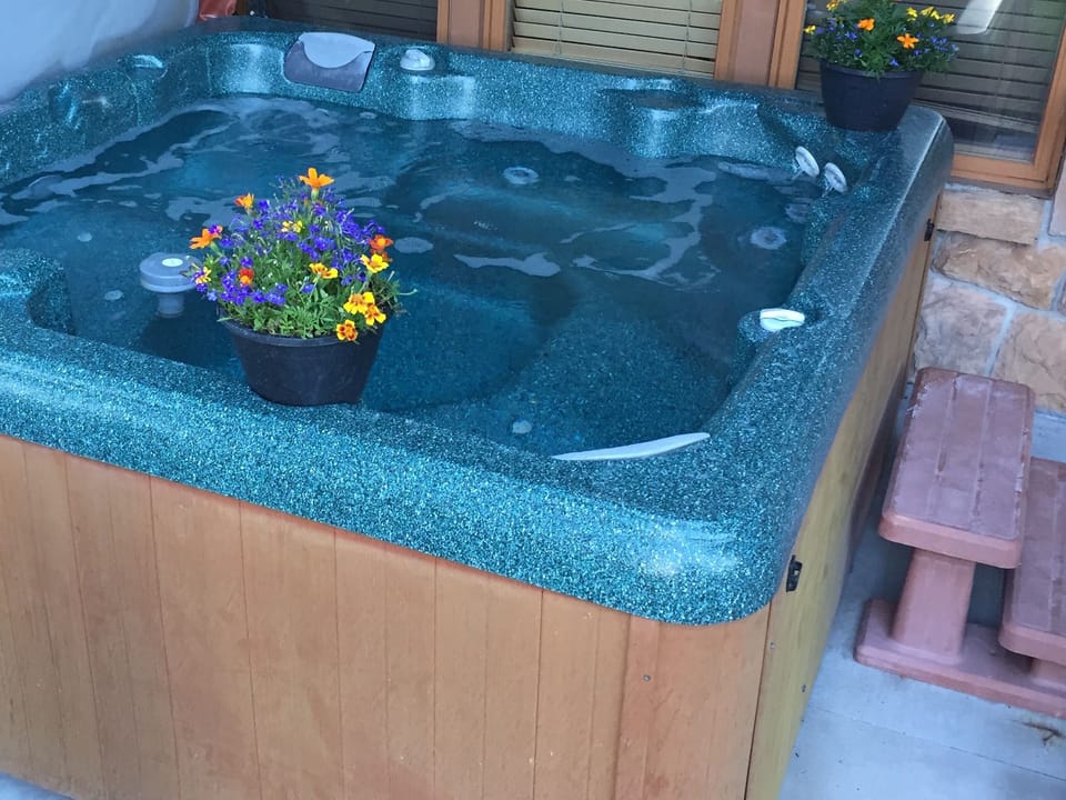 Soak!  Our 6-person hot tub has an easy-lift cover.