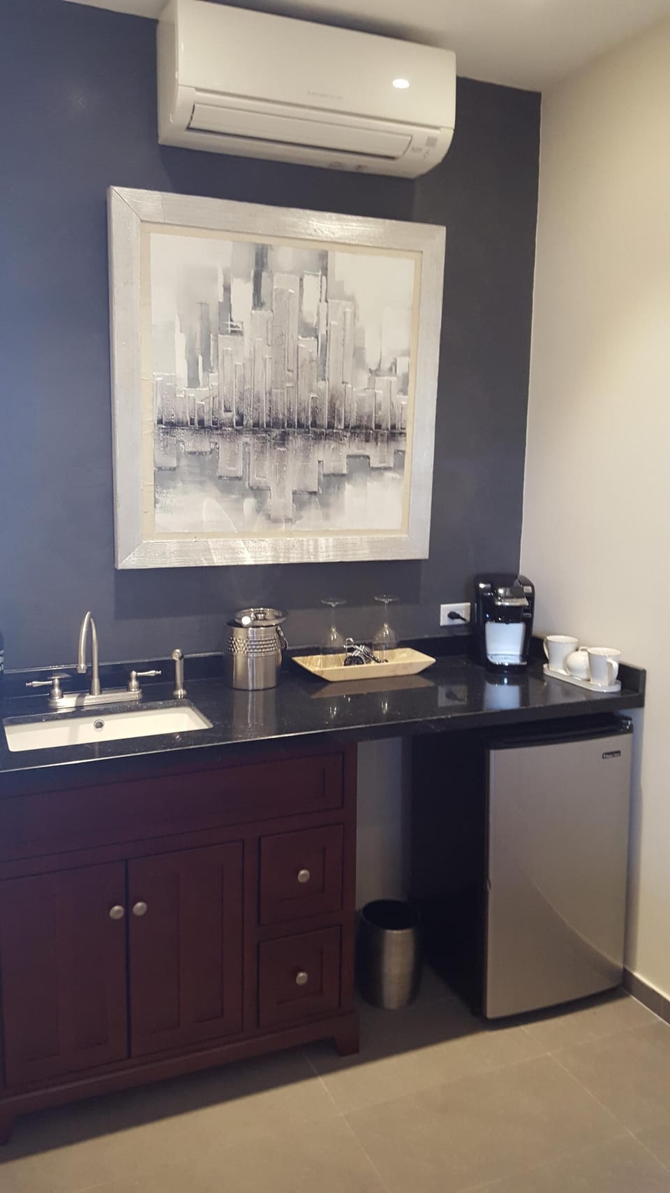 Wet bar located in master suite bathroom. 