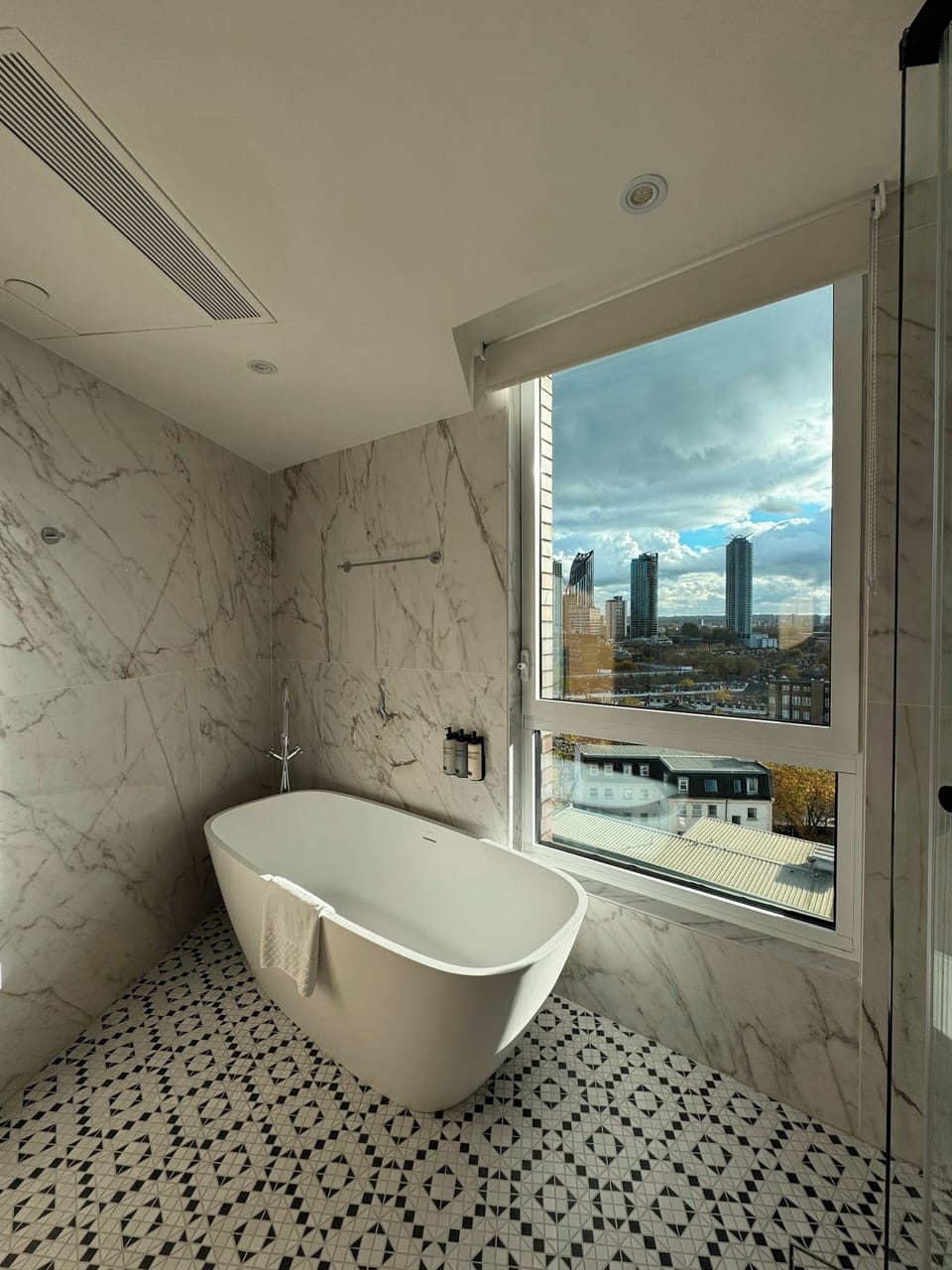 Eco-friendly toiletries, hair dryer, towels