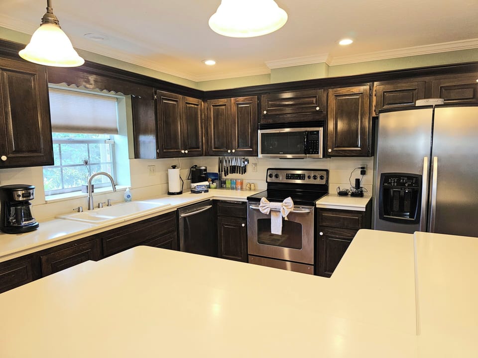 Coffee Maker, Keurig, Microwave, Stove, Refrigerator and Stand Alone Ice Maker.