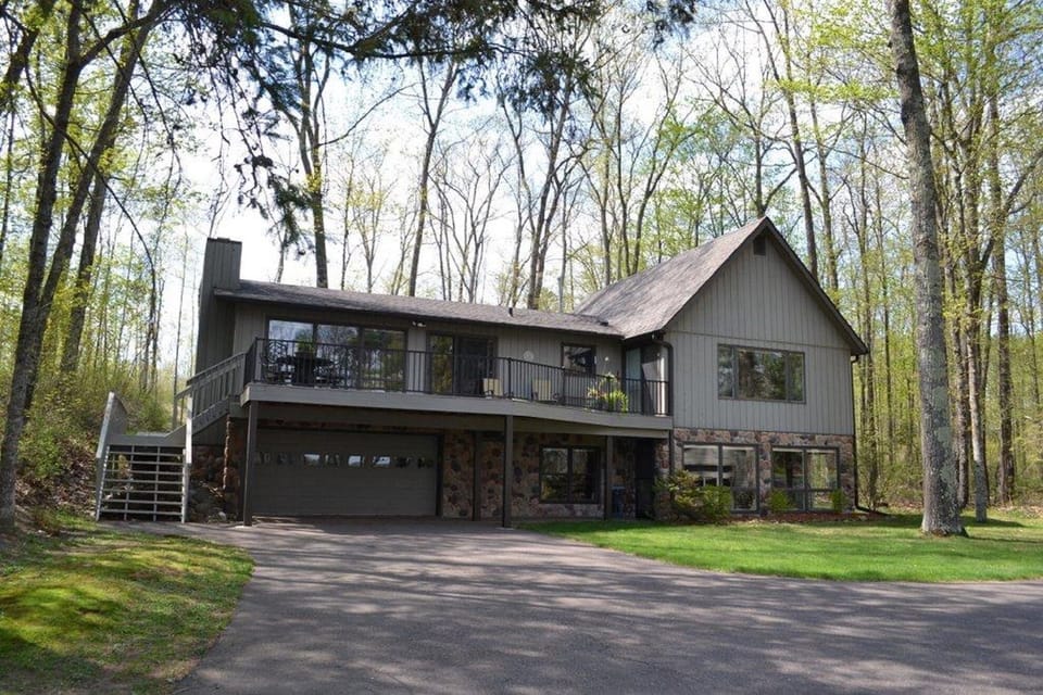 Large lakeside deck with dining and new gas grill.